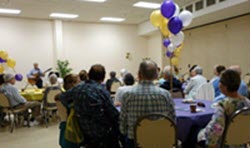 Seniors attending a memory cafe
